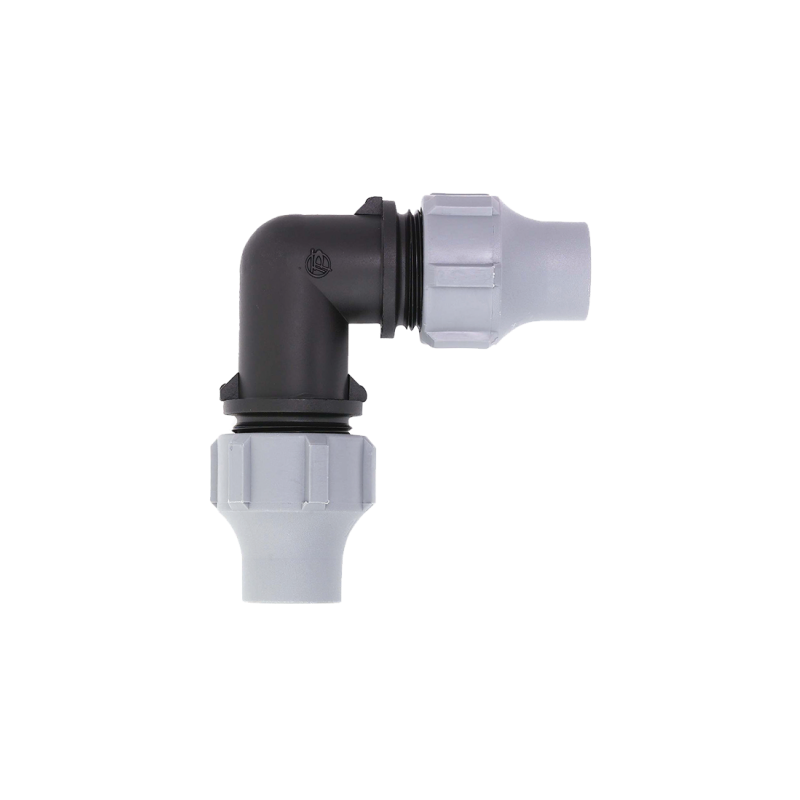 Nut lock elbow fitting for irrigation pipe systems